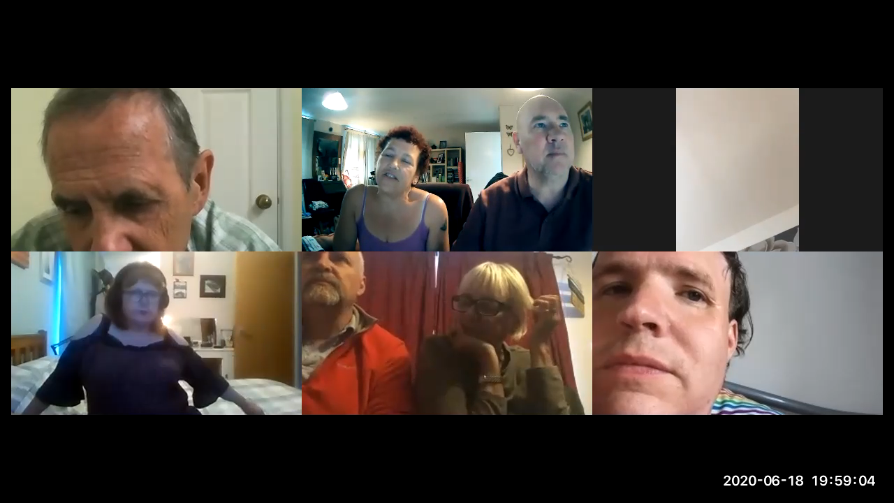 Several people on a computer screen talking via Zoom