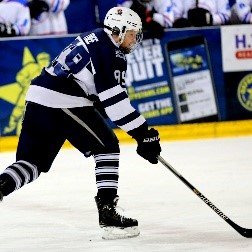 Nathan playing ice hockey