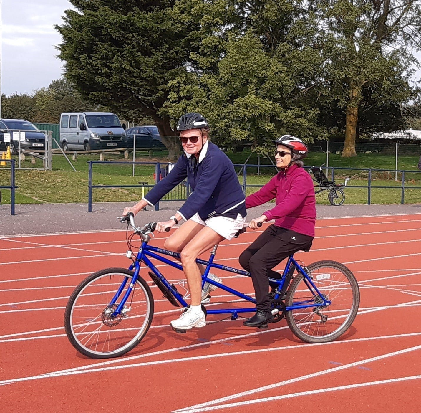 Janet and Savita on a tandem