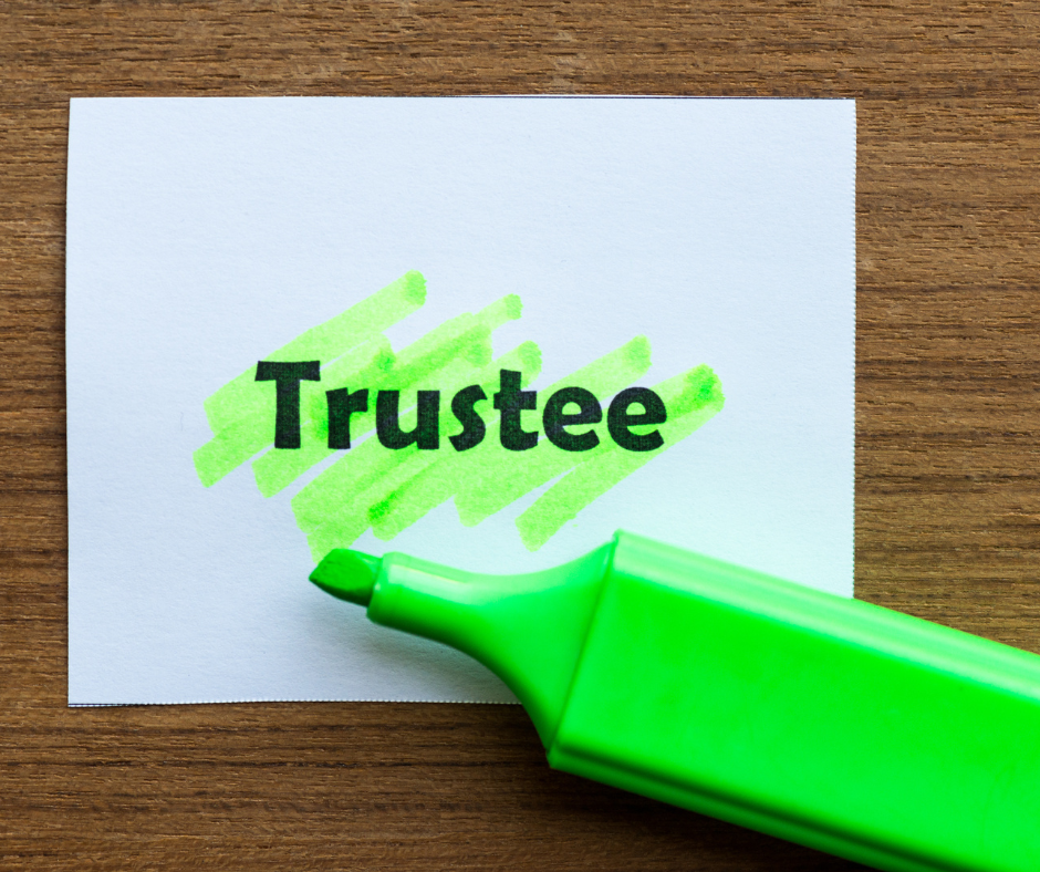 The word trustee on a sticky note higlighted by a green pen