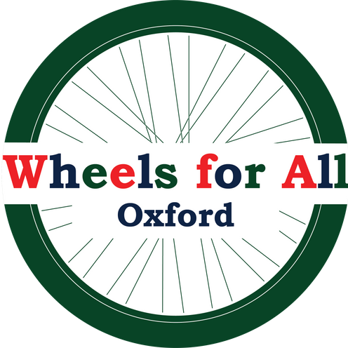 Wheels for All logo. Name is written on top of a bicycle wheel