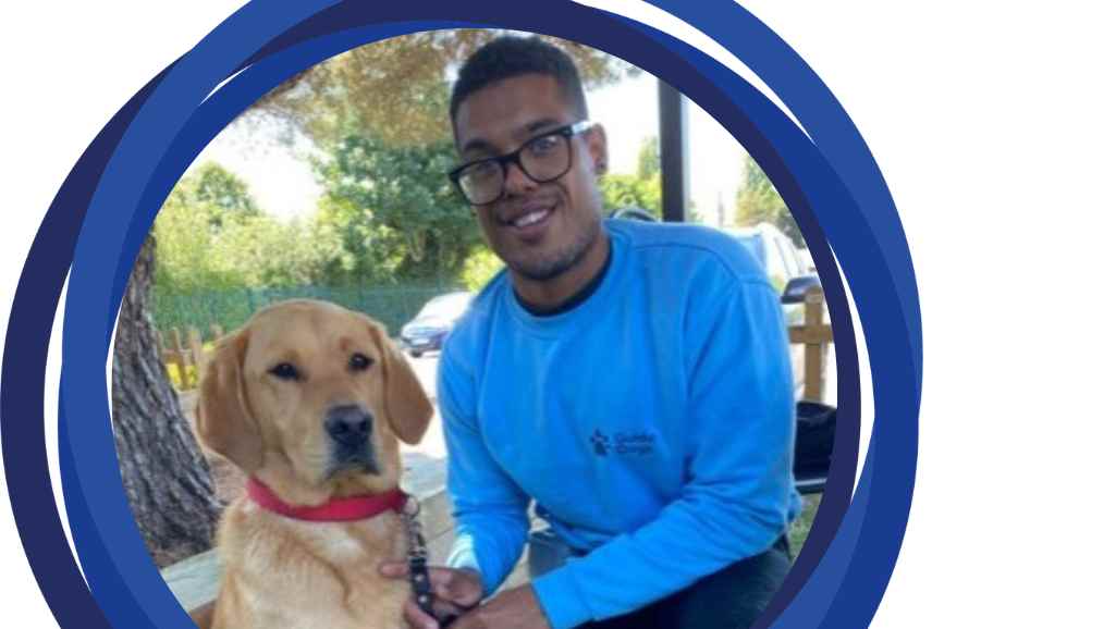 A photo of Devante and his guide dog Mack