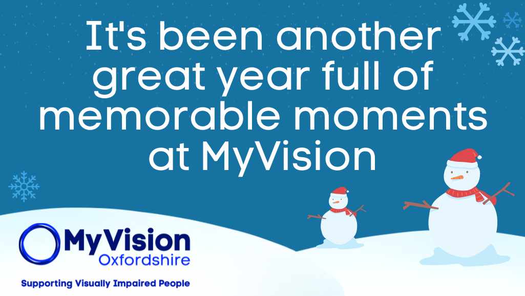 'It's been another great year full of memorable moments at MyVision' written on a Christmas themed background with a snow hill, snowflakes, and two snowmen.