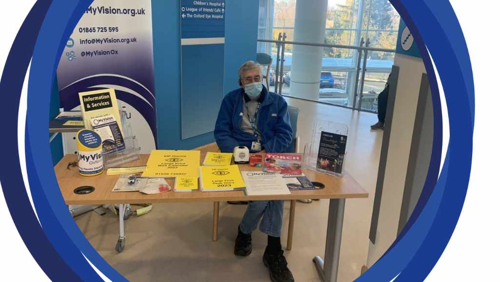 Our volunteer, Ian sitting behind the sight desk