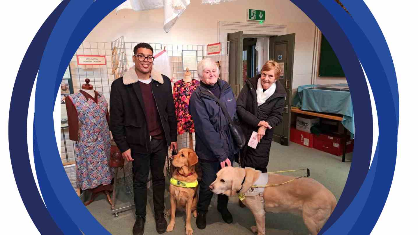 Mary (middle) with her guide dog