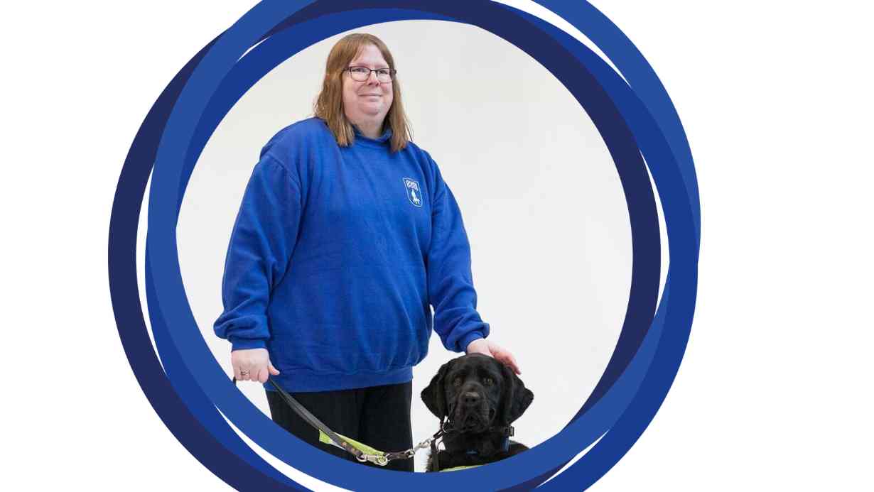 Nicola posing for a photo with her guide dog.