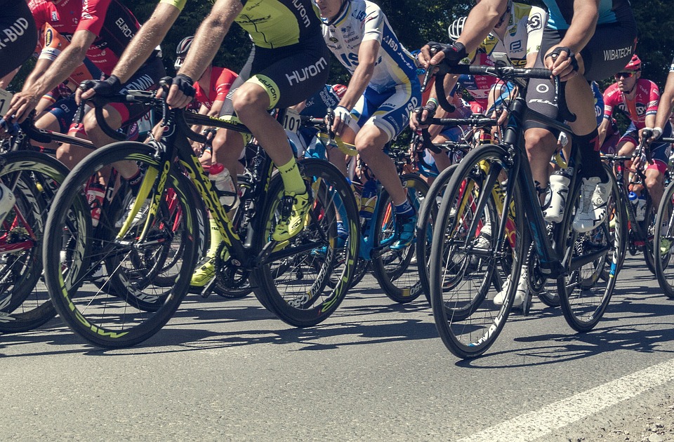 Stock photo of people riding bikes
