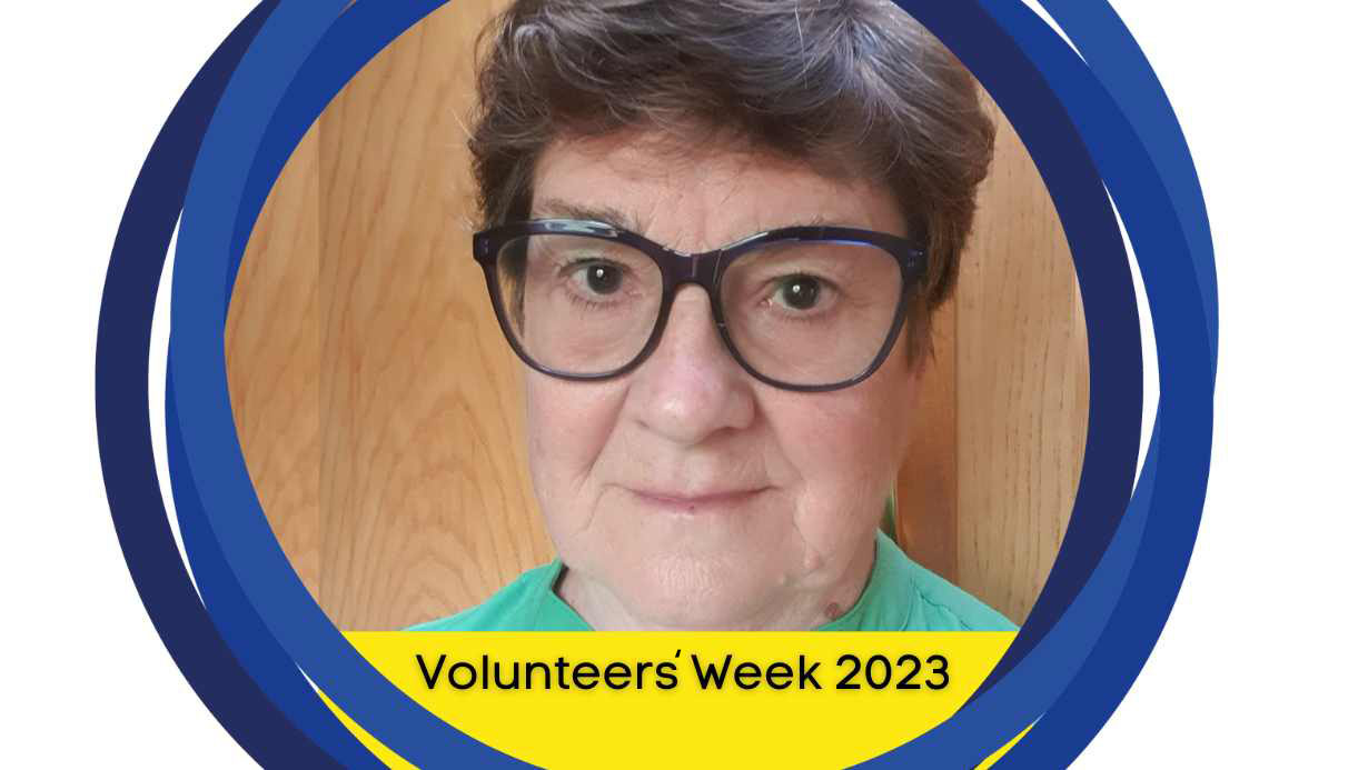 A portrait photo of Avril with a yellow banner below that says 'Volunteers' Week 2023.'