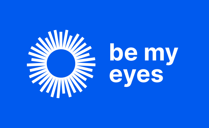 Be My Eyes logo of a white sun on a blue background with the name of the app beside it